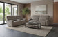 Caleb - Power Headrest Power Reclining Sofa With Auto-Glide - Raisin