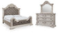 Bruchandi King Upholstered Panel Bed with Mirrored Dresser