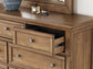 Vandenmore Queen Storage Sleigh Bed with Mirrored Dresser