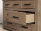 Garistyn Queen Panel Storage Bed. Dresser, Mirror and Nightstand